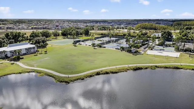 swimming view of a city with lake view