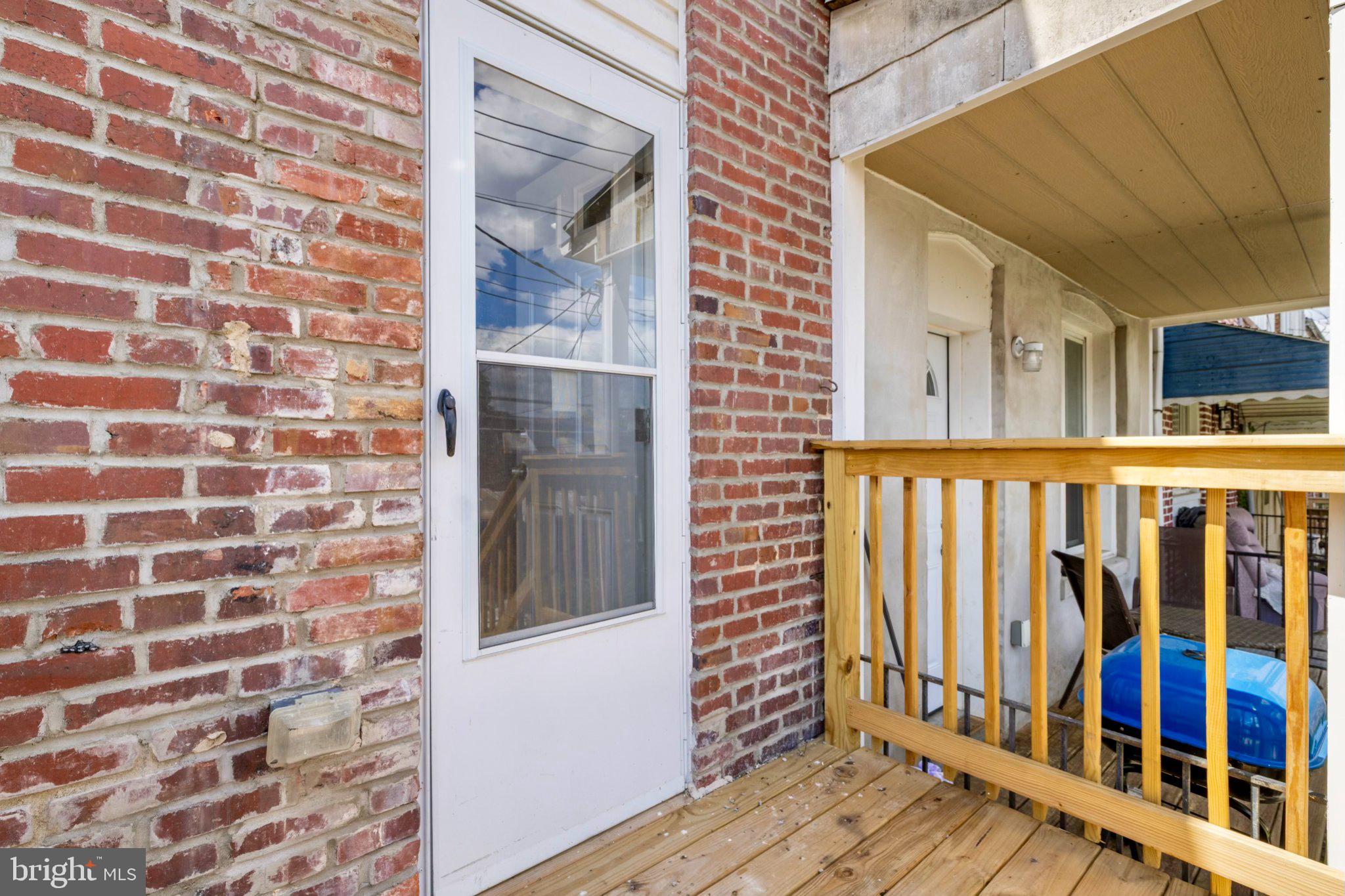 145 North Monastery Avenue Baltimore, MD 21229 - Photo 20 of 45 Charming brick entryway with deck.