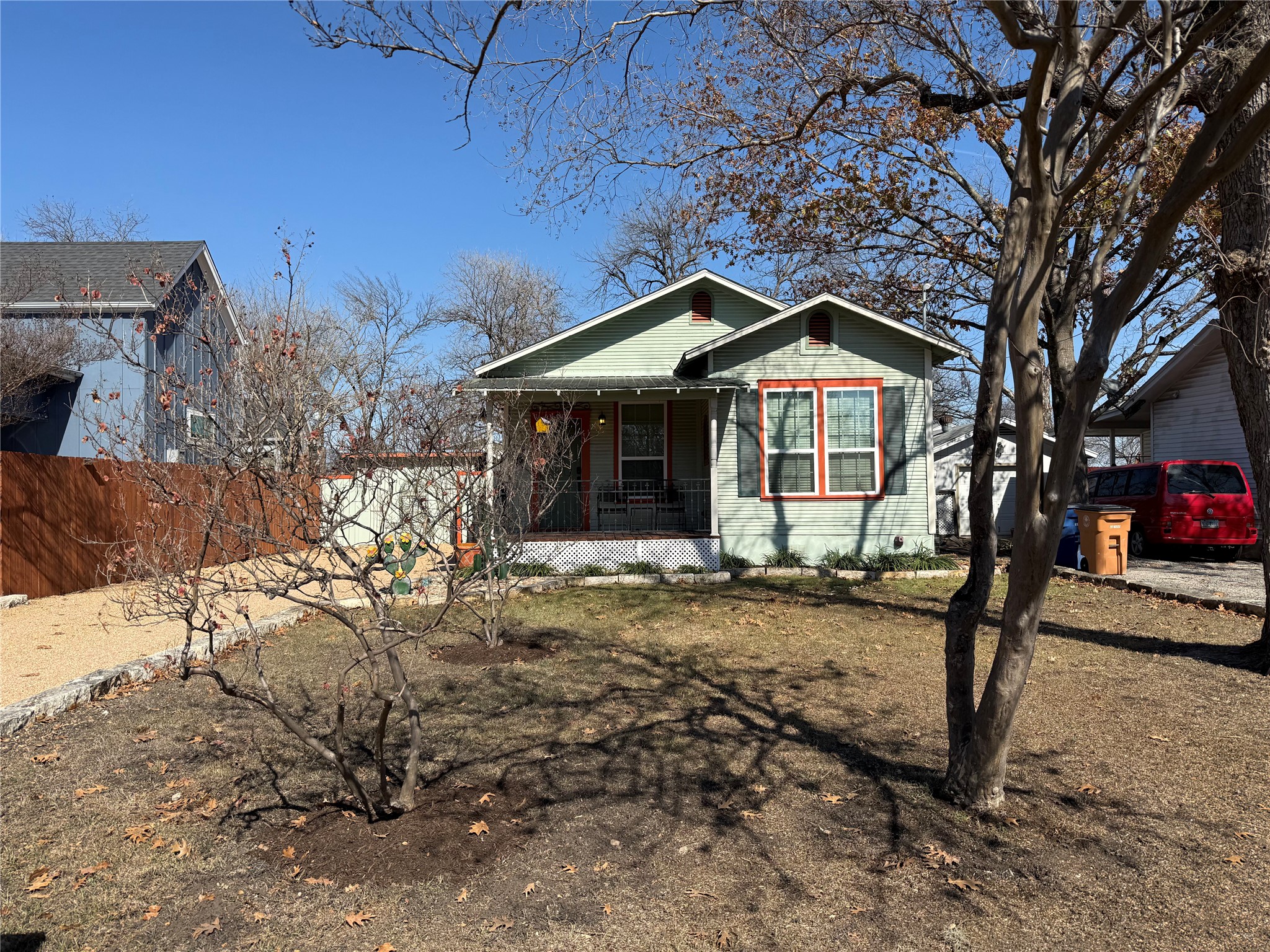 406 Normandy Street Austin, TX 78704 - Photo 2 of 13 a front view of a house with garden
