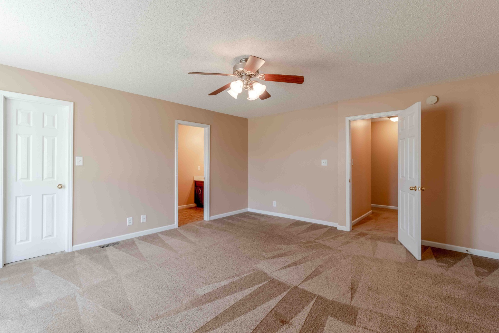 407 Filmore Road Oak Grove, KY 42262 - Photo 13 of 25 a view of an empty room with a ceiling fan