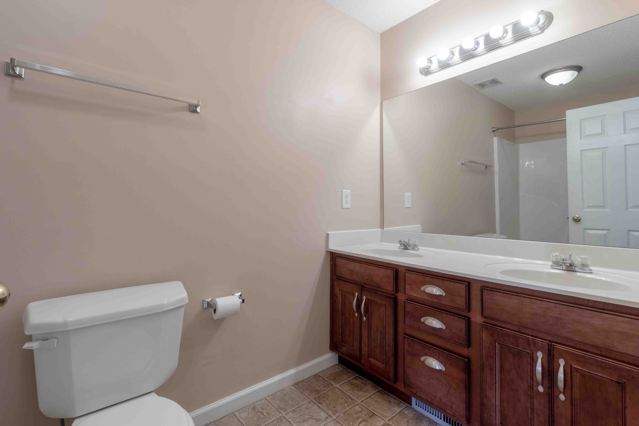 407 Filmore Road Oak Grove, KY 42262 - Photo 15 of 25 a bathroom with a toilet sink and mirror
