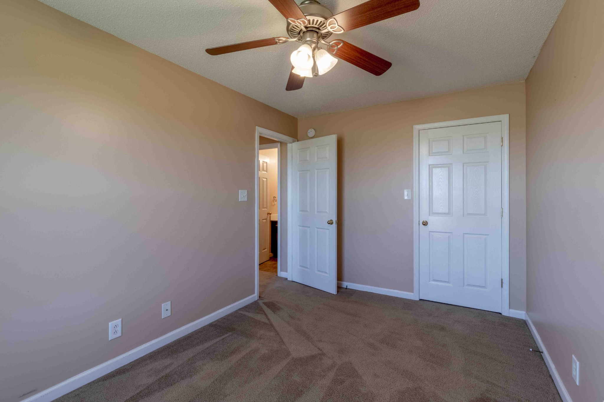 407 Filmore Road Oak Grove, KY 42262 - Photo 21 of 25 a view of an empty room and chandelier fan