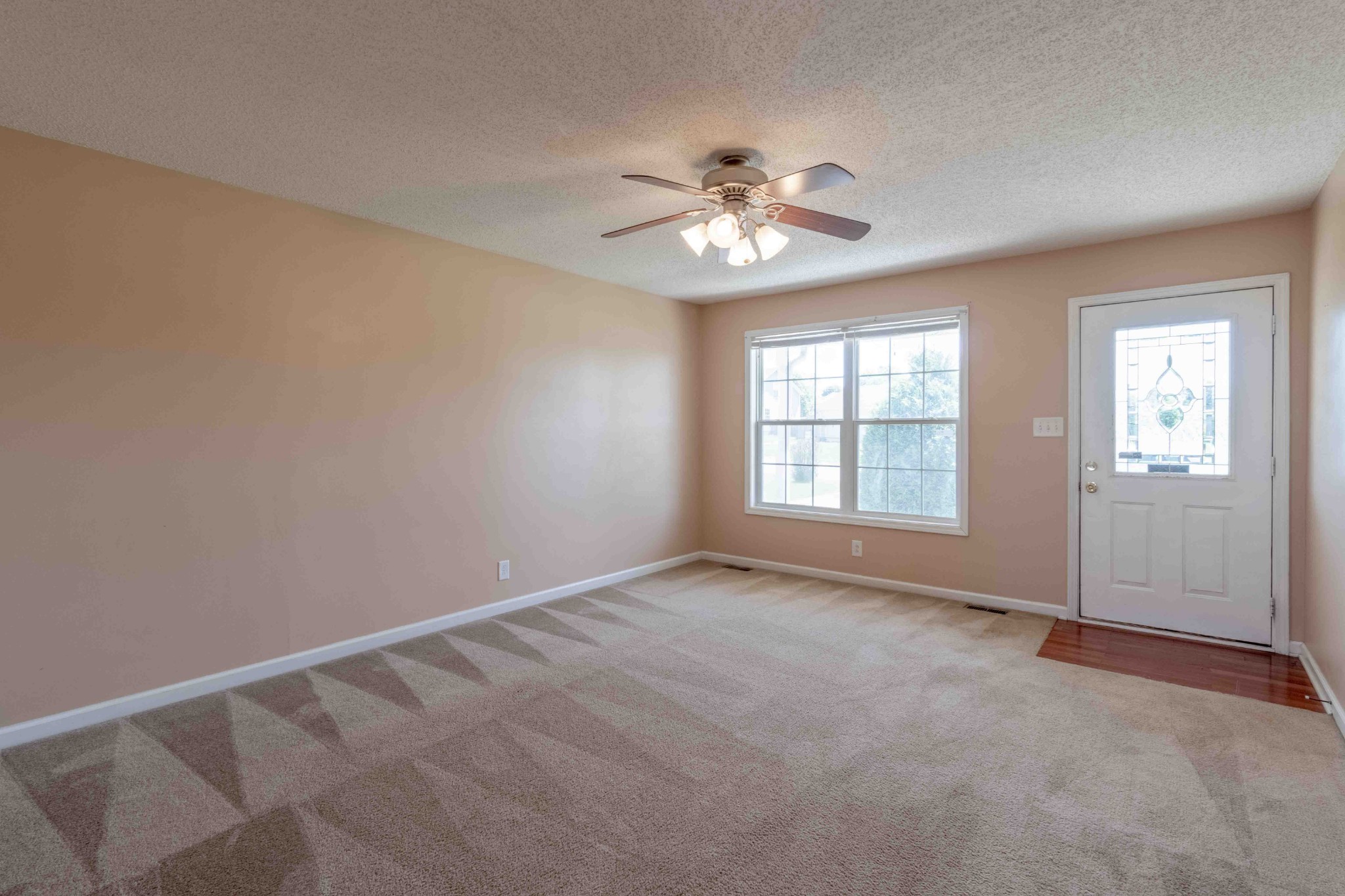 407 Filmore Road Oak Grove, KY 42262 - Photo 8 of 25 a view of an empty room with a window