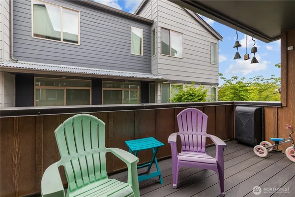 a view of a two chairs in the deck