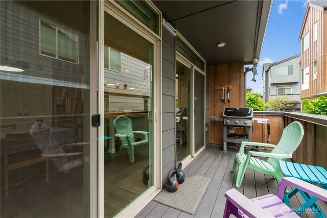 a view of balcony with furniture