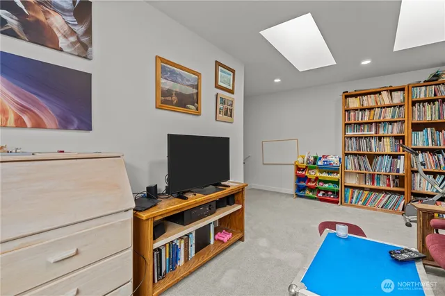 a room with furniture and a flat screen tv