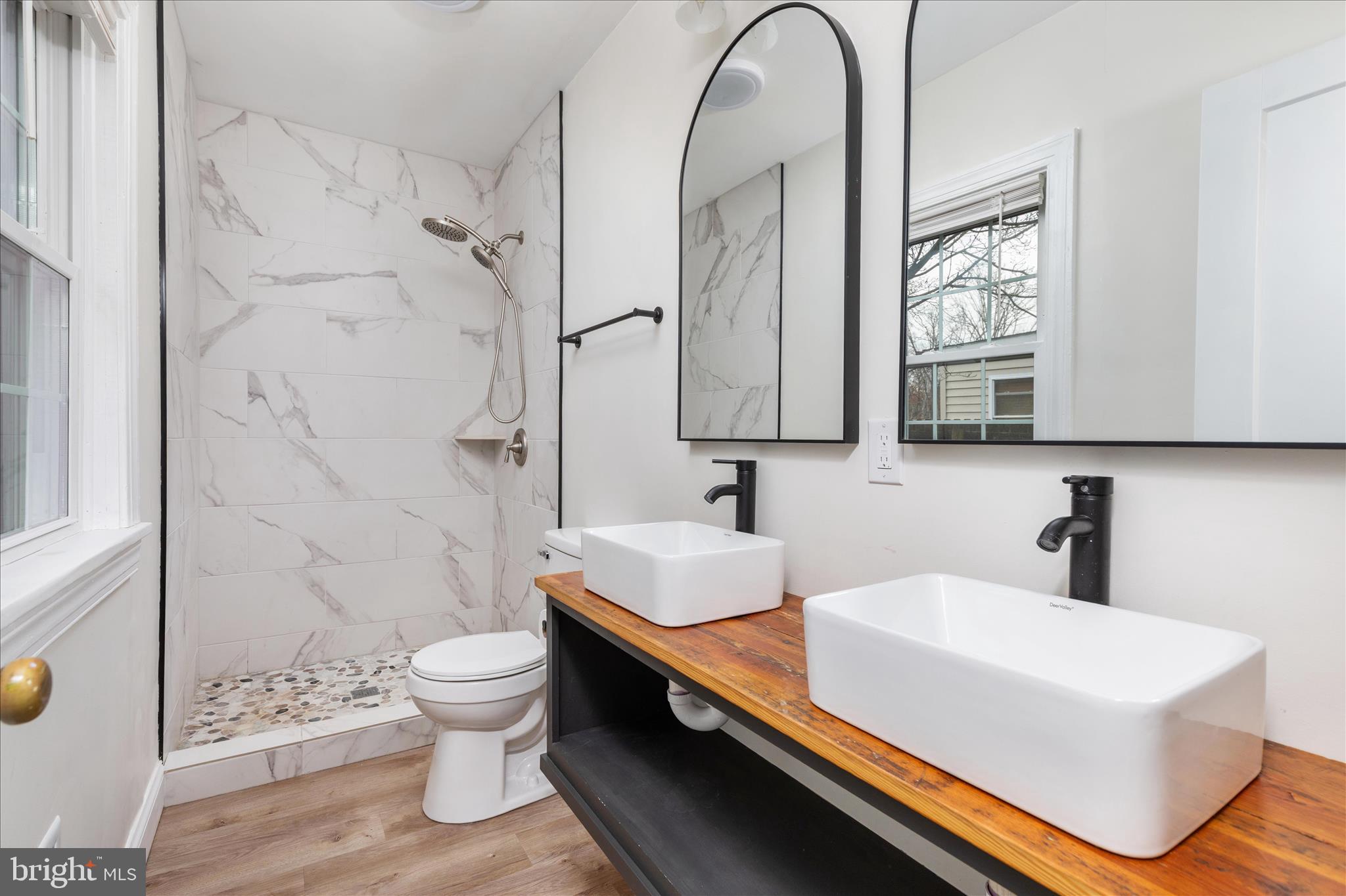 5655 Strasburg Road Strasburg, VA 22657 - Photo 24 of 85 a bathroom with a sink a toilet and shower