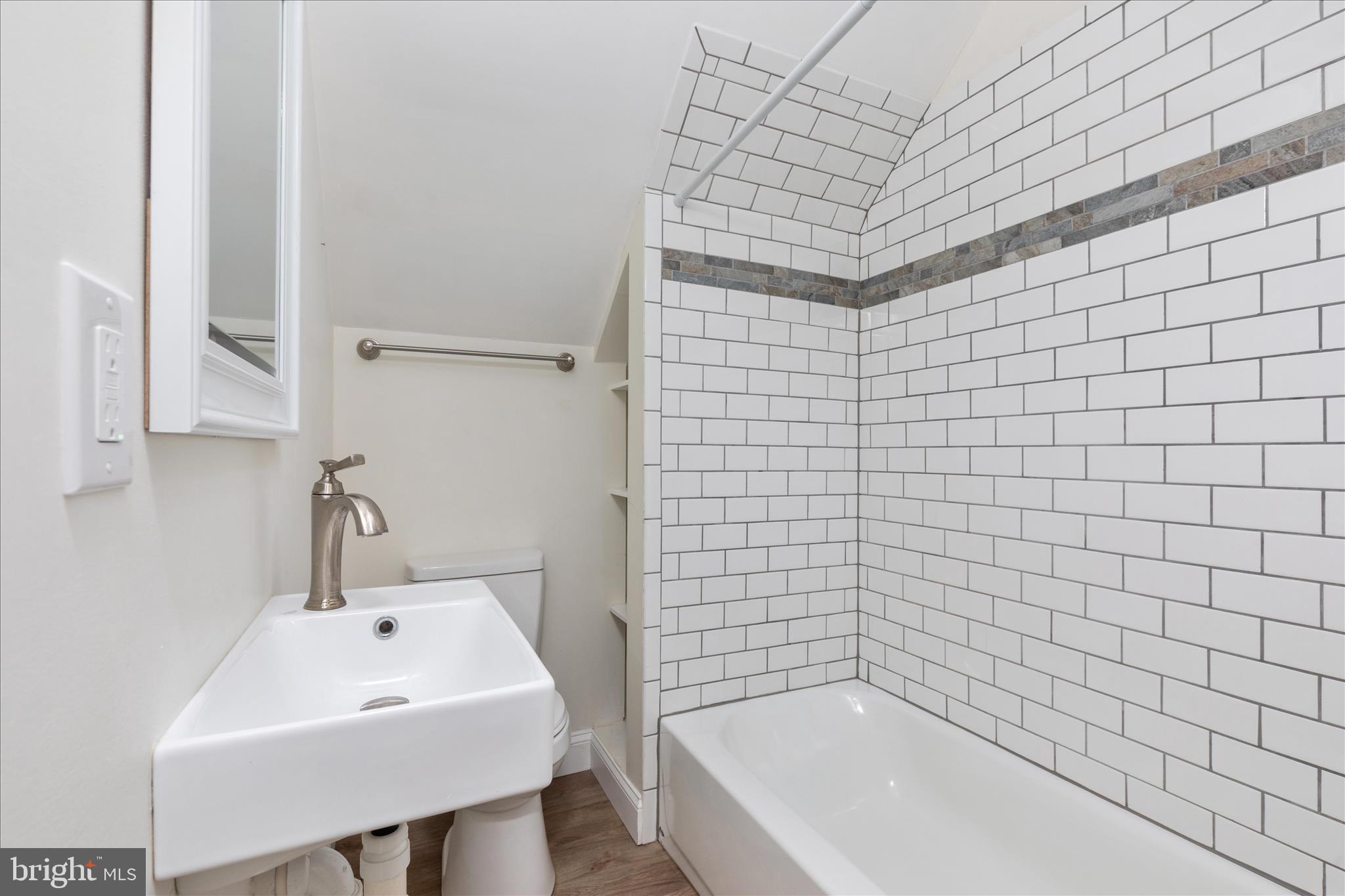 5655 Strasburg Road Strasburg, VA 22657 - Photo 29 of 85 a bathroom with a sink a toilet and shower
