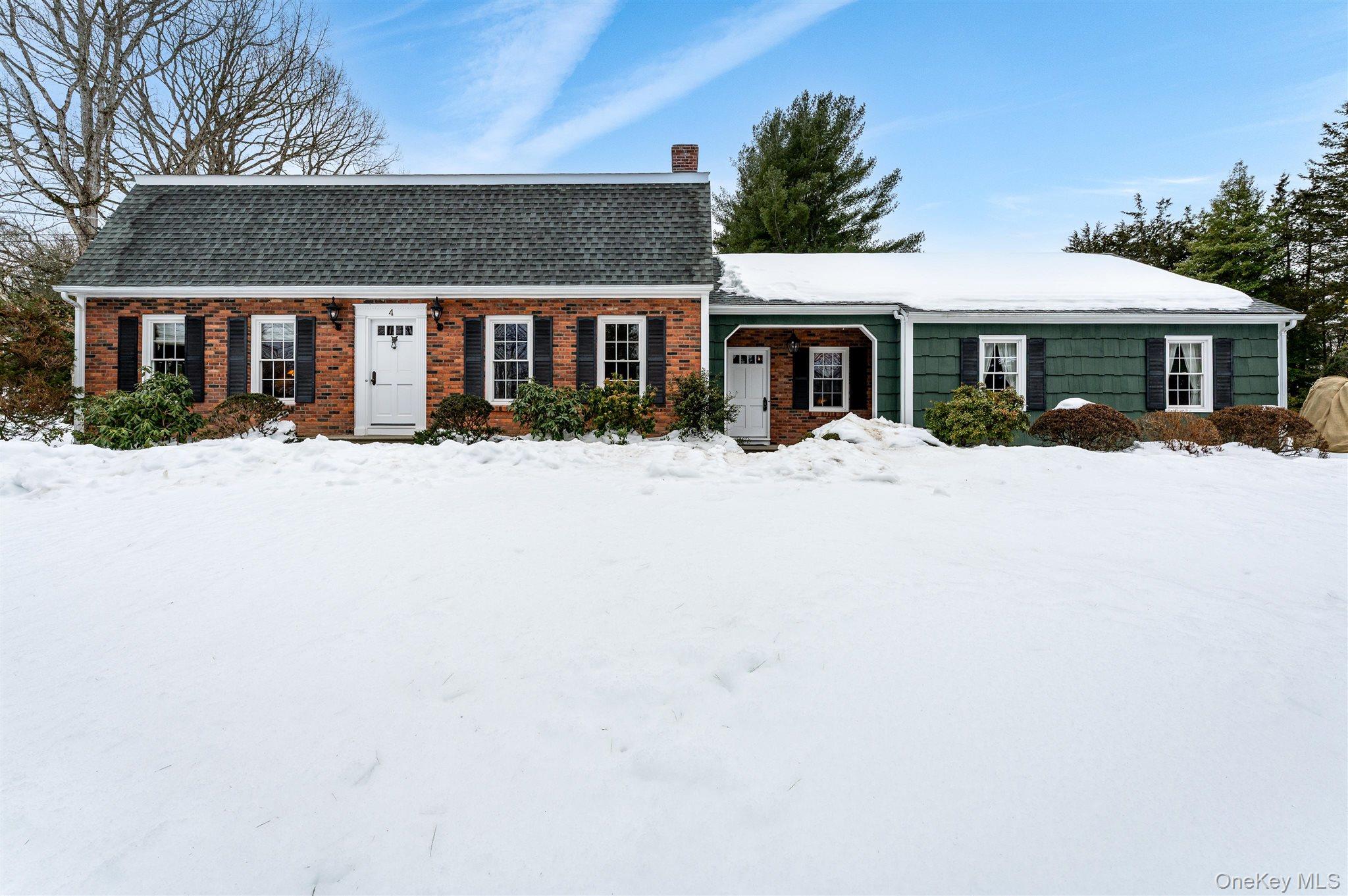 4 Raemont Road Granite Springs, NY 10527 - Photo 1 of 1 a front view of house with yard covered in snow