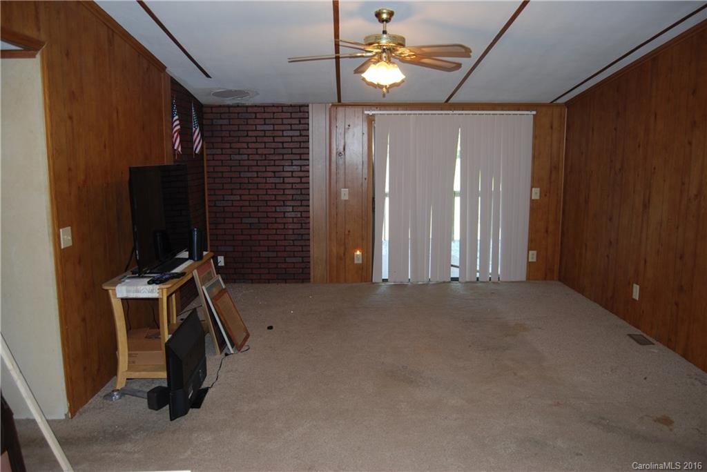 3224 Belk Mill Road Wingate, NC 28174 - Photo 3 of 13 a view of a room with gym equipment