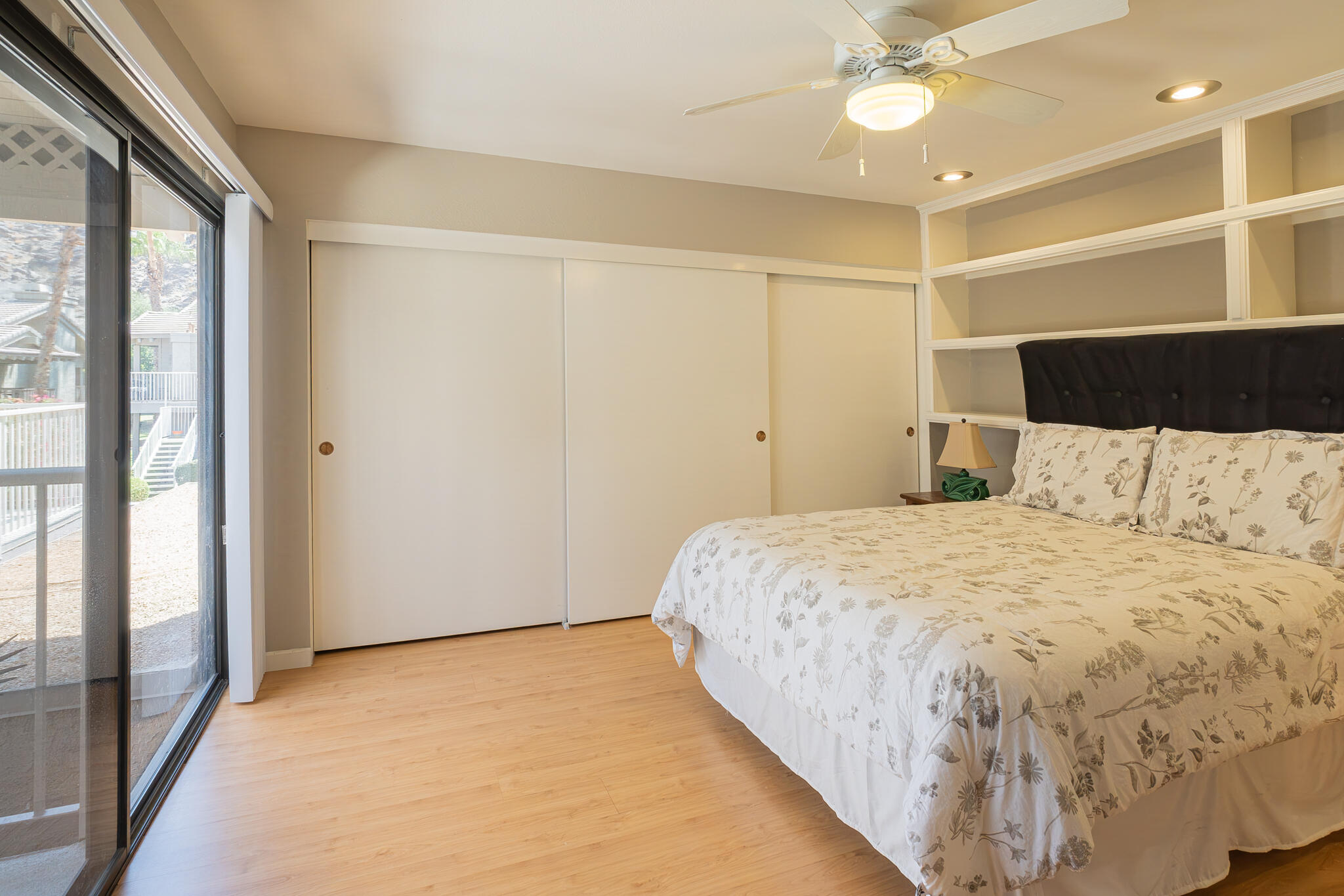 46631 Arapahoe, Unit B Indian Wells, CA 92210 - Photo 25 of 32 a large bed in a room next to a window