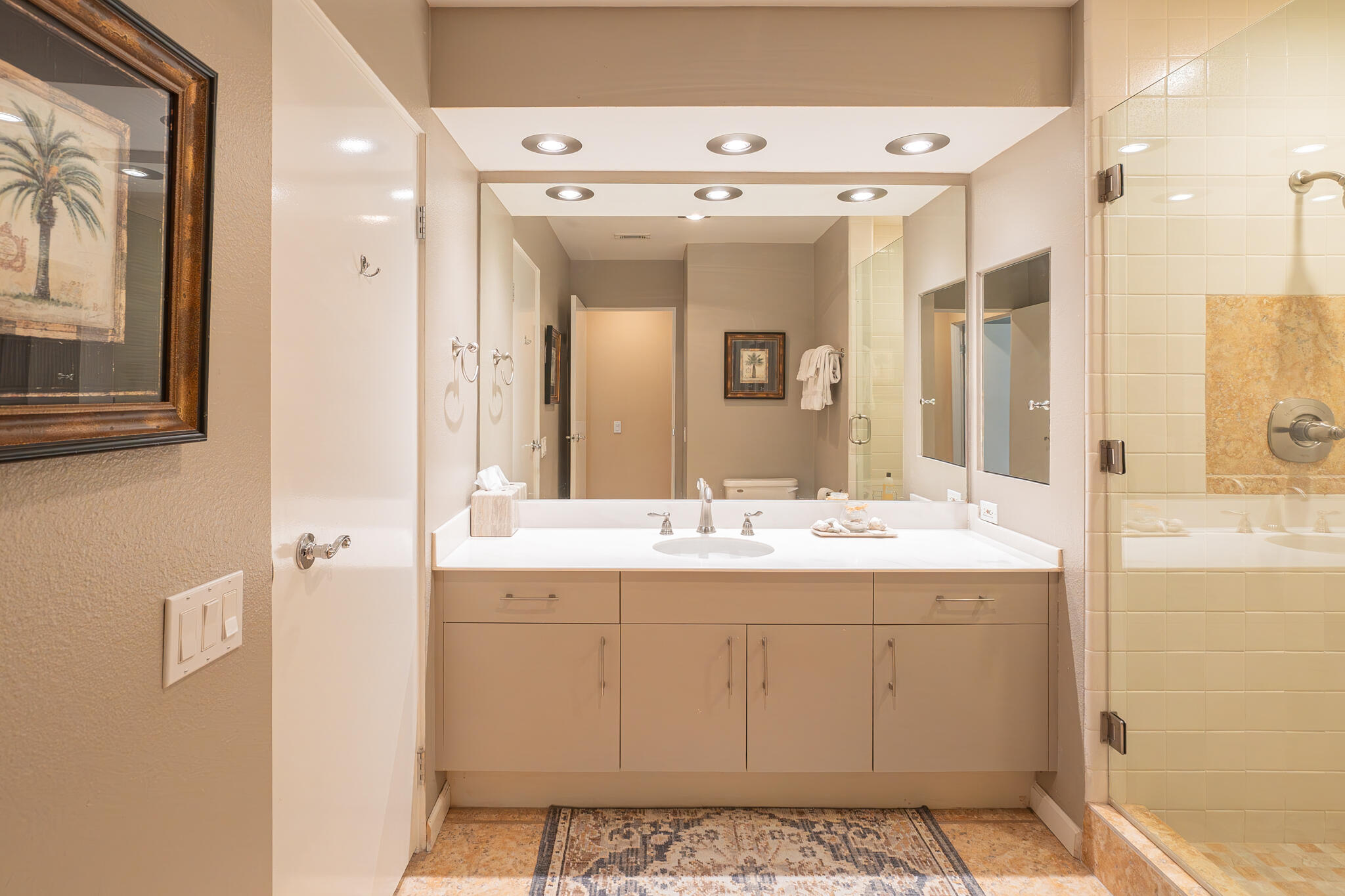 46631 Arapahoe, Unit B Indian Wells, CA 92210 - Photo 26 of 32 a bathroom with a sink and a mirror