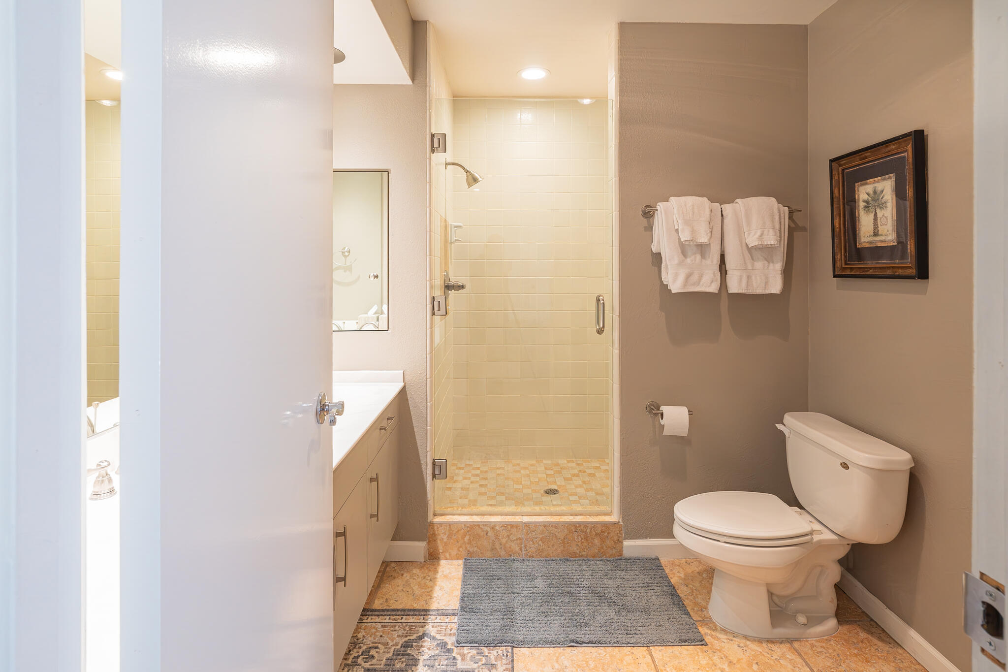 46631 Arapahoe, Unit B Indian Wells, CA 92210 - Photo 27 of 32 a bathroom with a toilet and a shower