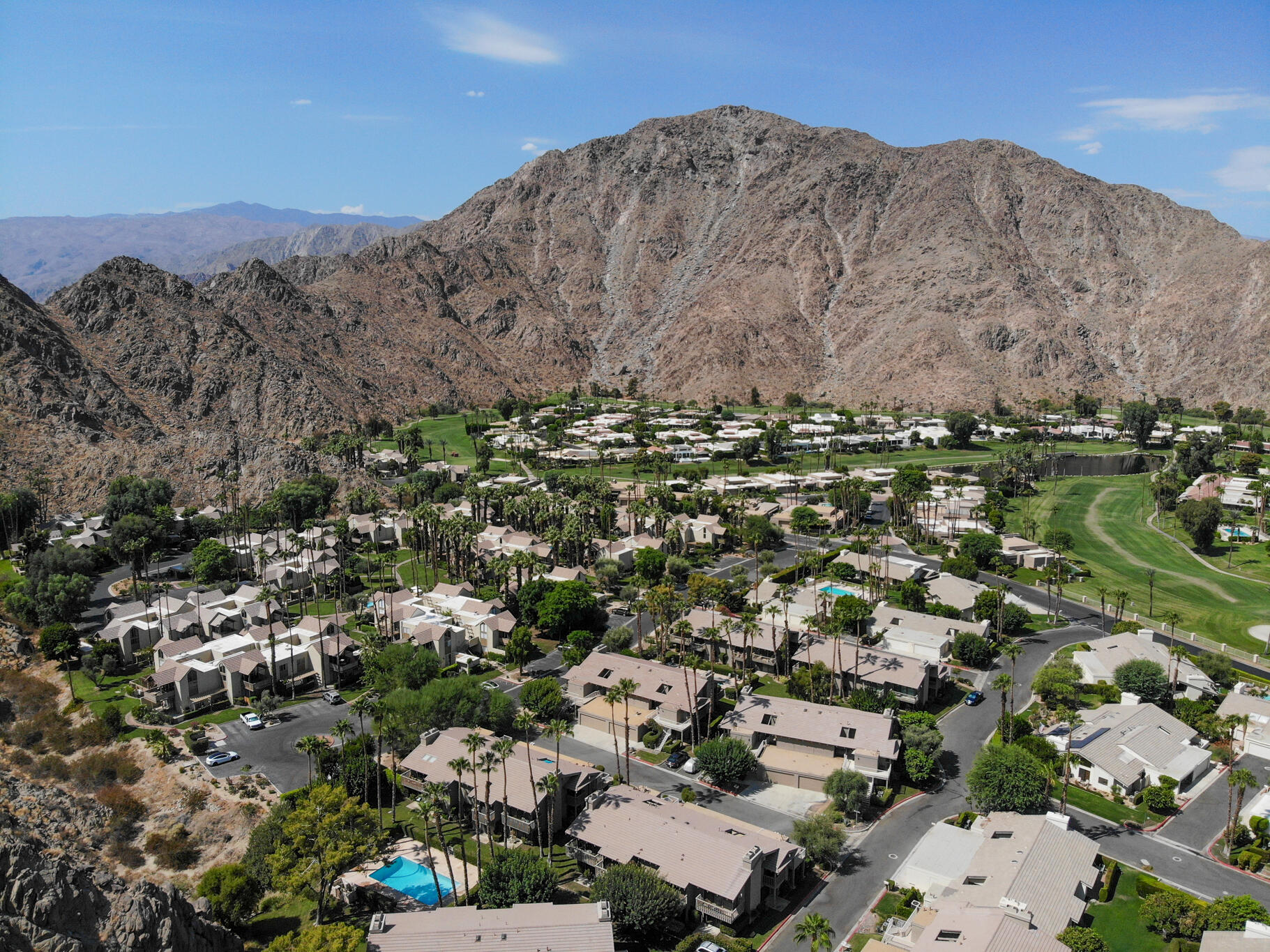 46631 Arapahoe, Unit B Indian Wells, CA 92210 - Photo 3 of 32 an aerial view of a house with a street