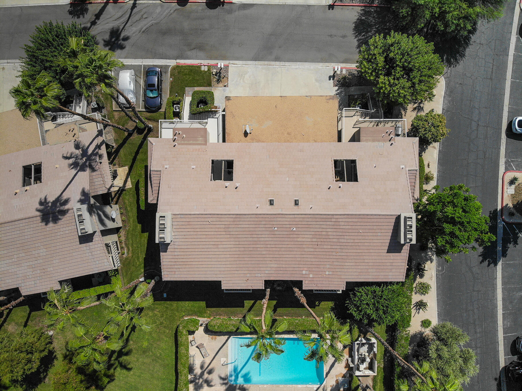 46631 Arapahoe, Unit B Indian Wells, CA 92210 - Photo 32 of 32 an aerial view of a house with swimming pool