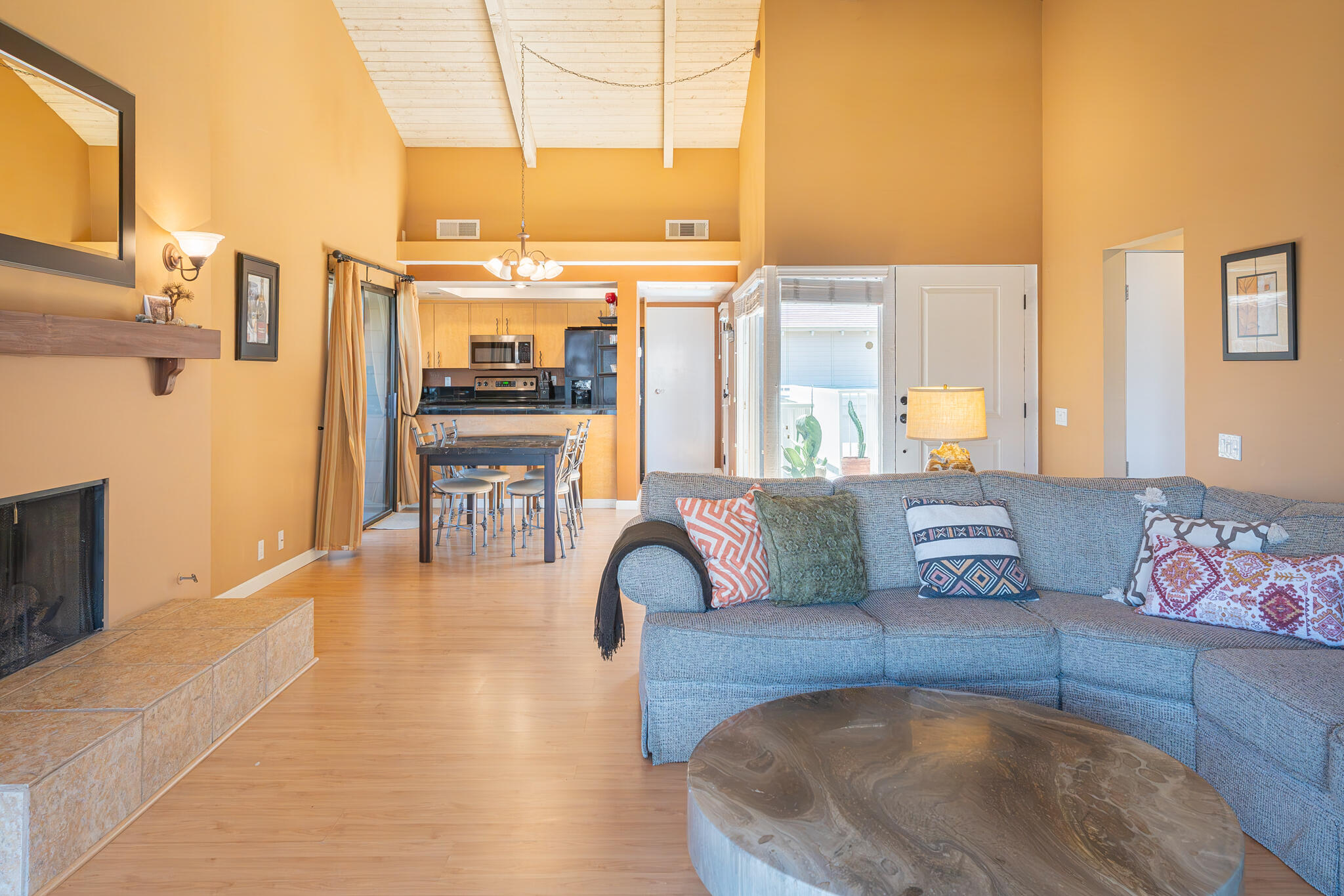 46631 Arapahoe, Unit B Indian Wells, CA 92210 - Photo 10 of 32 a living room with furniture and a large window