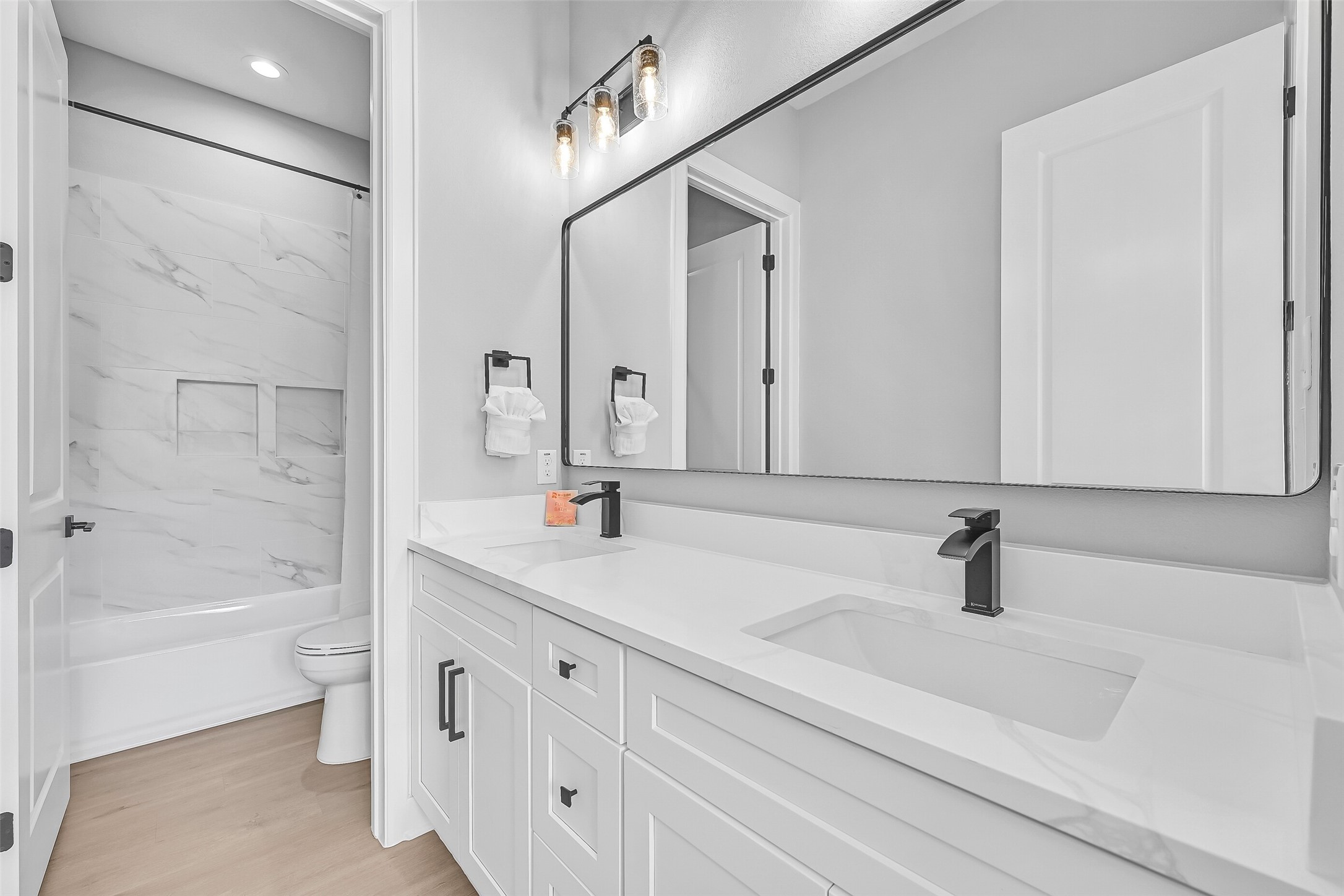16728 West Beach Road Jamaica Beach, TX 77554 - Photo 39 of 46 An additional full bath with a tub/shower combo is located next to the third bedroom for added convenience.