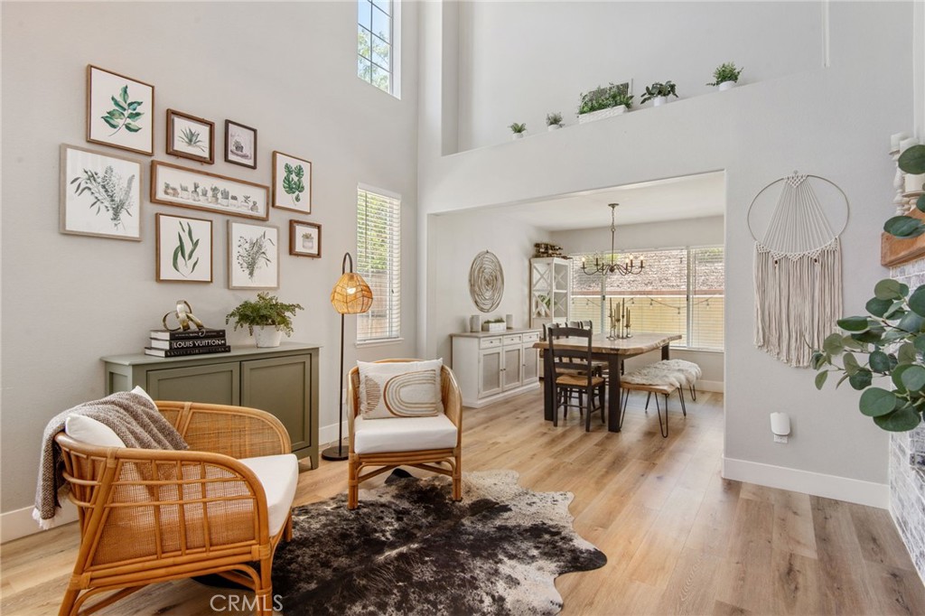 40456 Windsor Road Temecula, CA 92591 - Photo 3 of 38 a living room with furniture and wooden floor