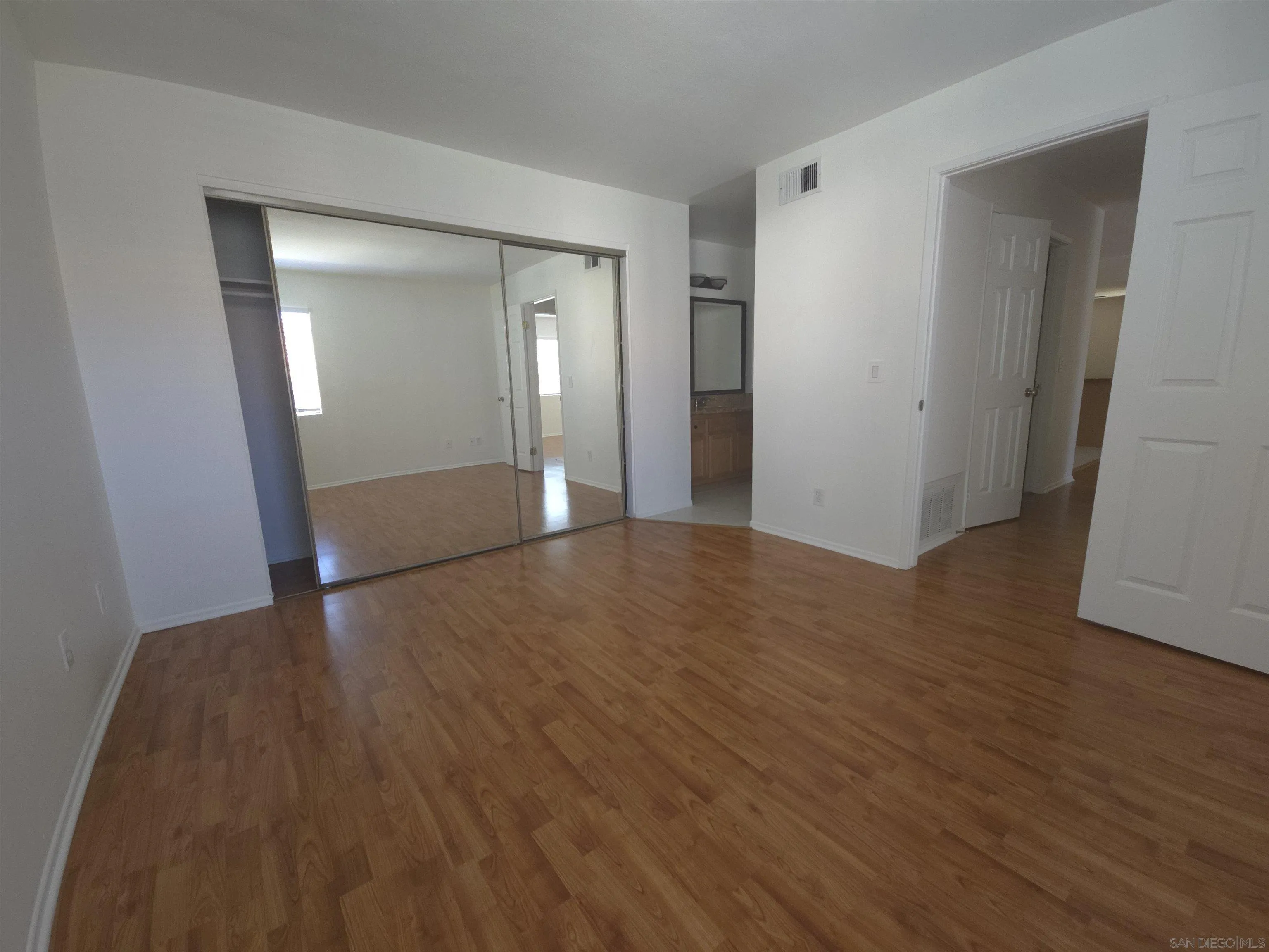 1130 West Blaine Street, Unit 204 Riverside, CA 92507 - Photo 13 of 24 a view of a livingroom with wooden floor
