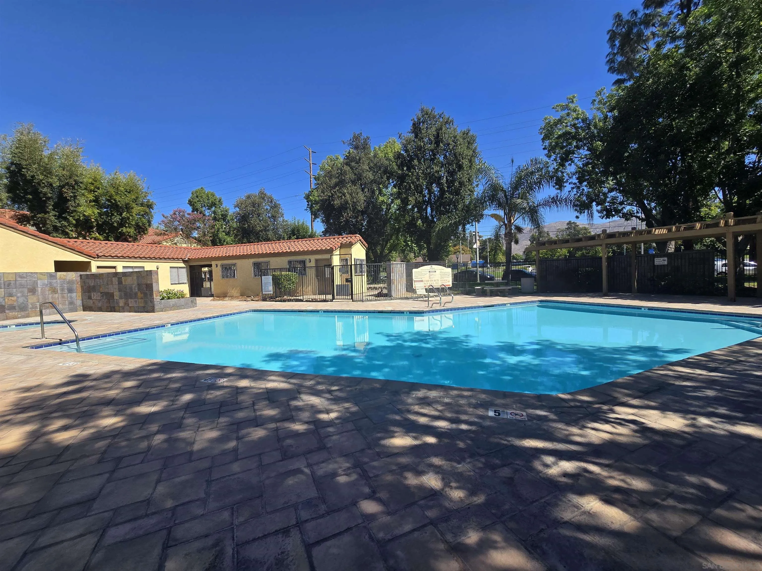 1130 West Blaine Street, Unit 204 Riverside, CA 92507 - Photo 17 of 24 a front view of house with yard and green space