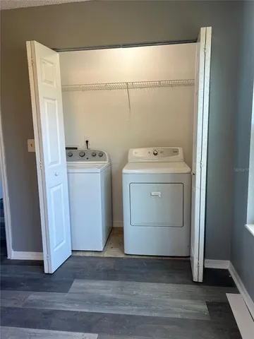 a utility room with dryer and washer