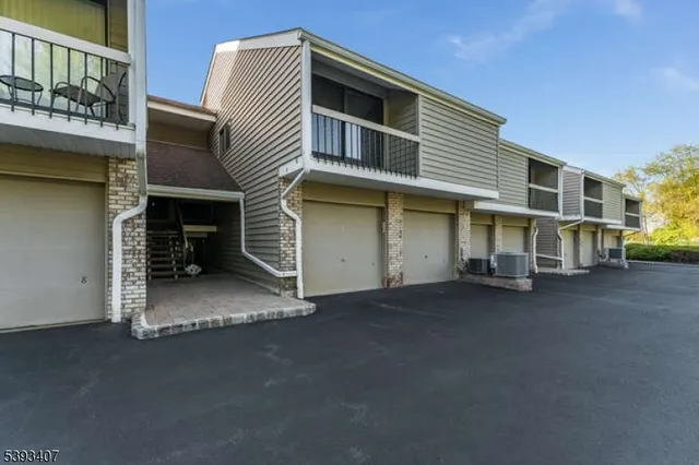 a view of a house with a garage