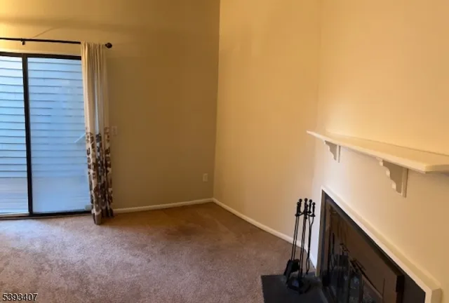 a view of a room with staircase