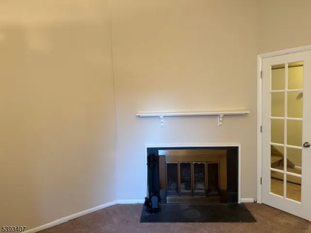 a living room with a fireplace