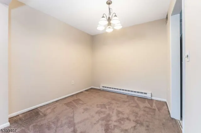 a view of a room with an empty space