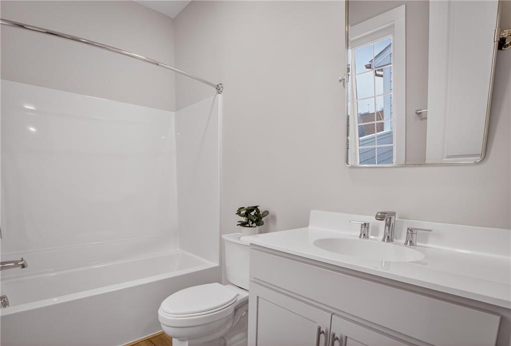 4022 Cottage Way Bridgeville, PA 15017 - Photo 37 of 47 a bathroom with a sink a toilet and a bathtub