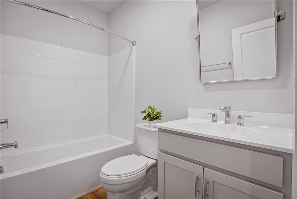 4022 Cottage Way Bridgeville, PA 15017 - Photo 44 of 47 a bathroom with a sink a toilet and a bathtub
