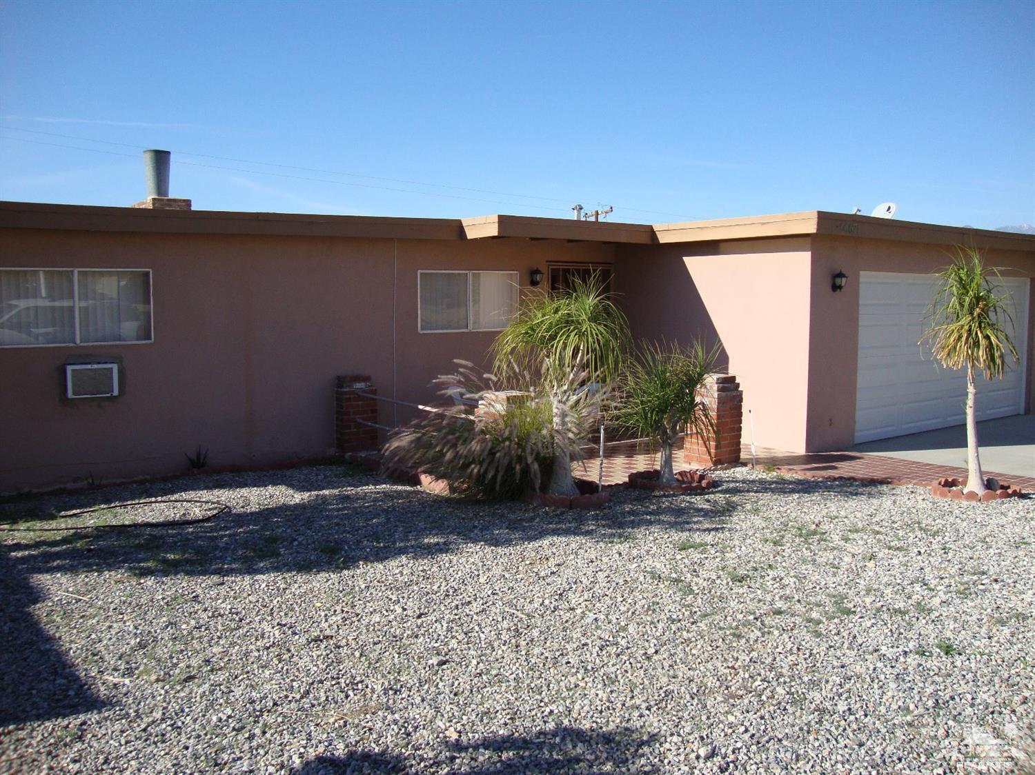 66671 San Rafael Road Desert Hot Springs, CA 92240 - Photo 4 of 36 a view of a garage