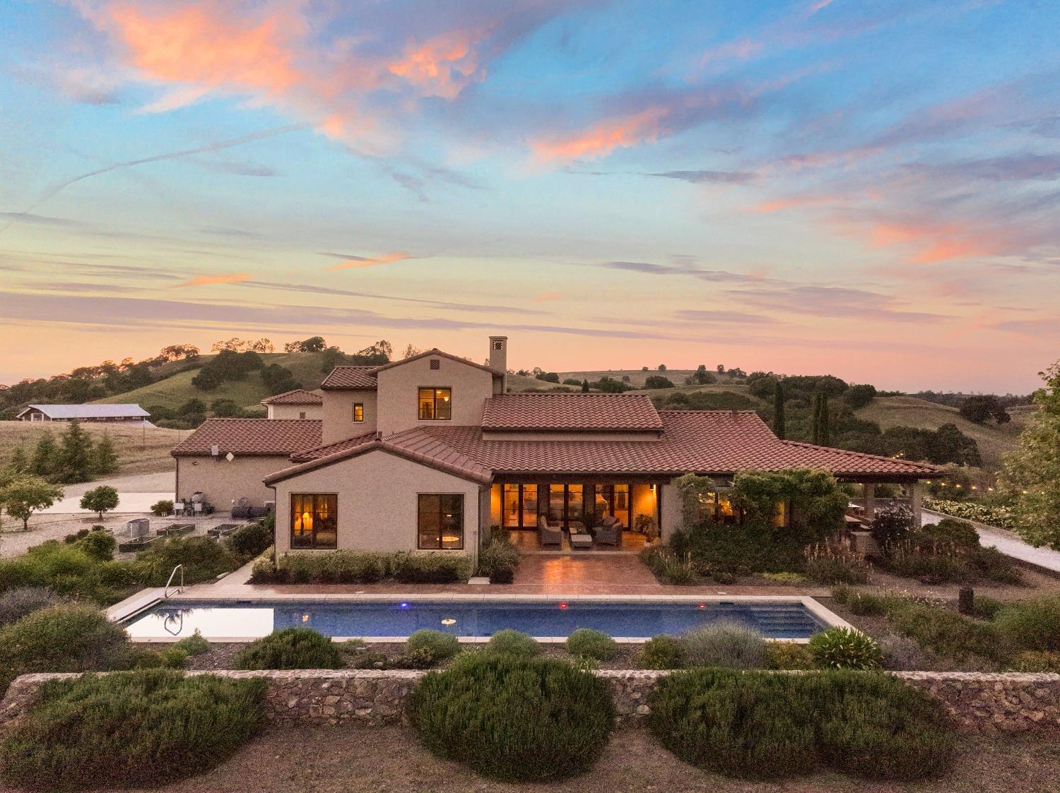 11011 Vintage Road Ione, CA 95640 - Photo 1 of 1 a view of a big house with a big yard and large trees