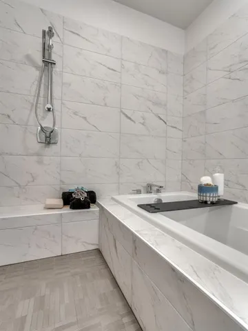 a bathroom with a sink and a bathtub