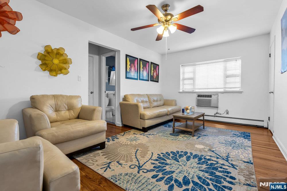 640 Franklin Avenue, Unit 2R Nutley, NJ 07110 - Photo 3 of 11 a living room with furniture and a window
