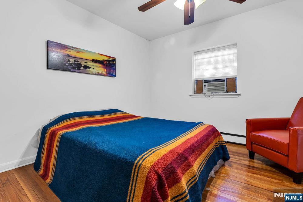 640 Franklin Avenue, Unit 2R Nutley, NJ 07110 - Photo 9 of 11 a bedroom with bed and bedroom