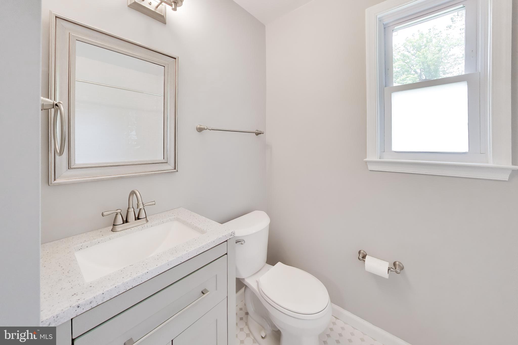 5816 Amelia Street Springfield, VA 22150 - Photo 24 of 36 Modern bathroom with sleek finishes.