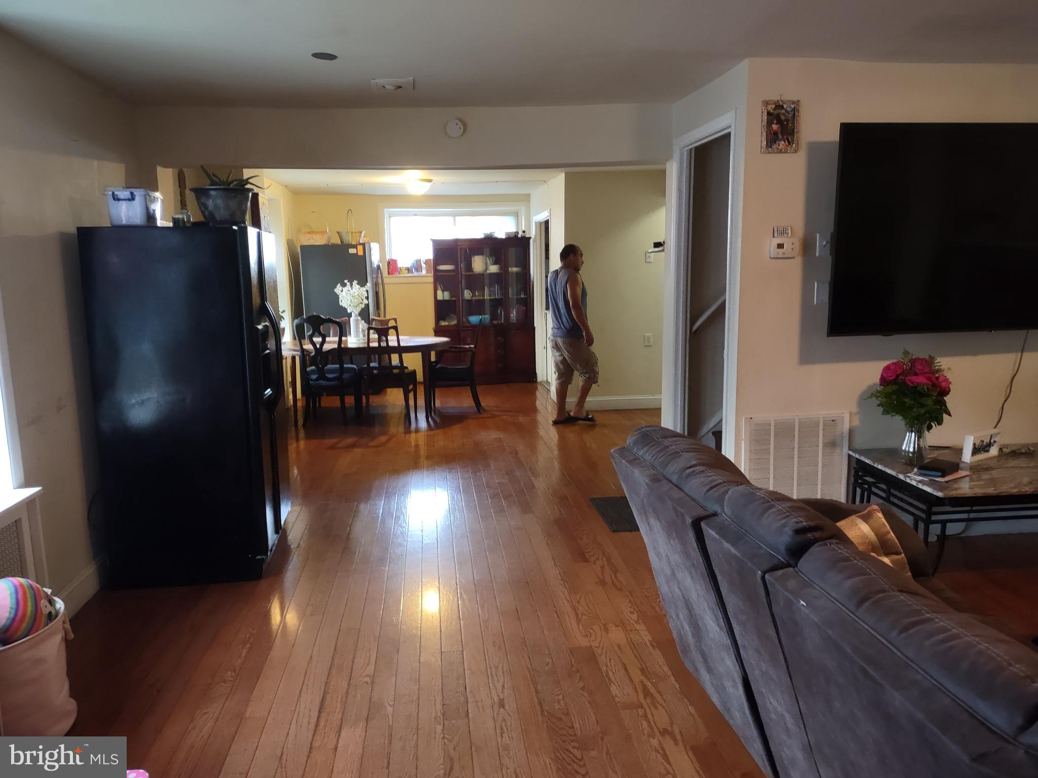 101 Copley Road Upper Darby, PA 19082 - Photo 23 of 36 a living room with furniture and a flat screen tv