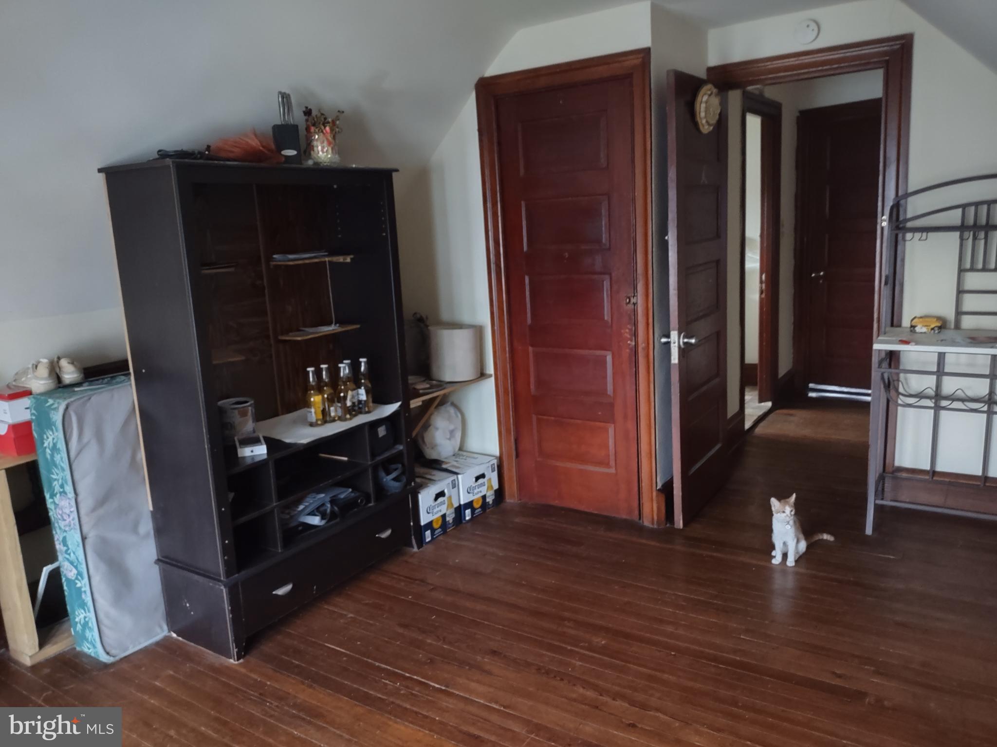 101 Copley Road Upper Darby, PA 19082 - Photo 30 of 36 a living room with furniture and wooden floor