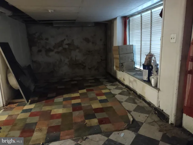 a bathroom with a glass door shower