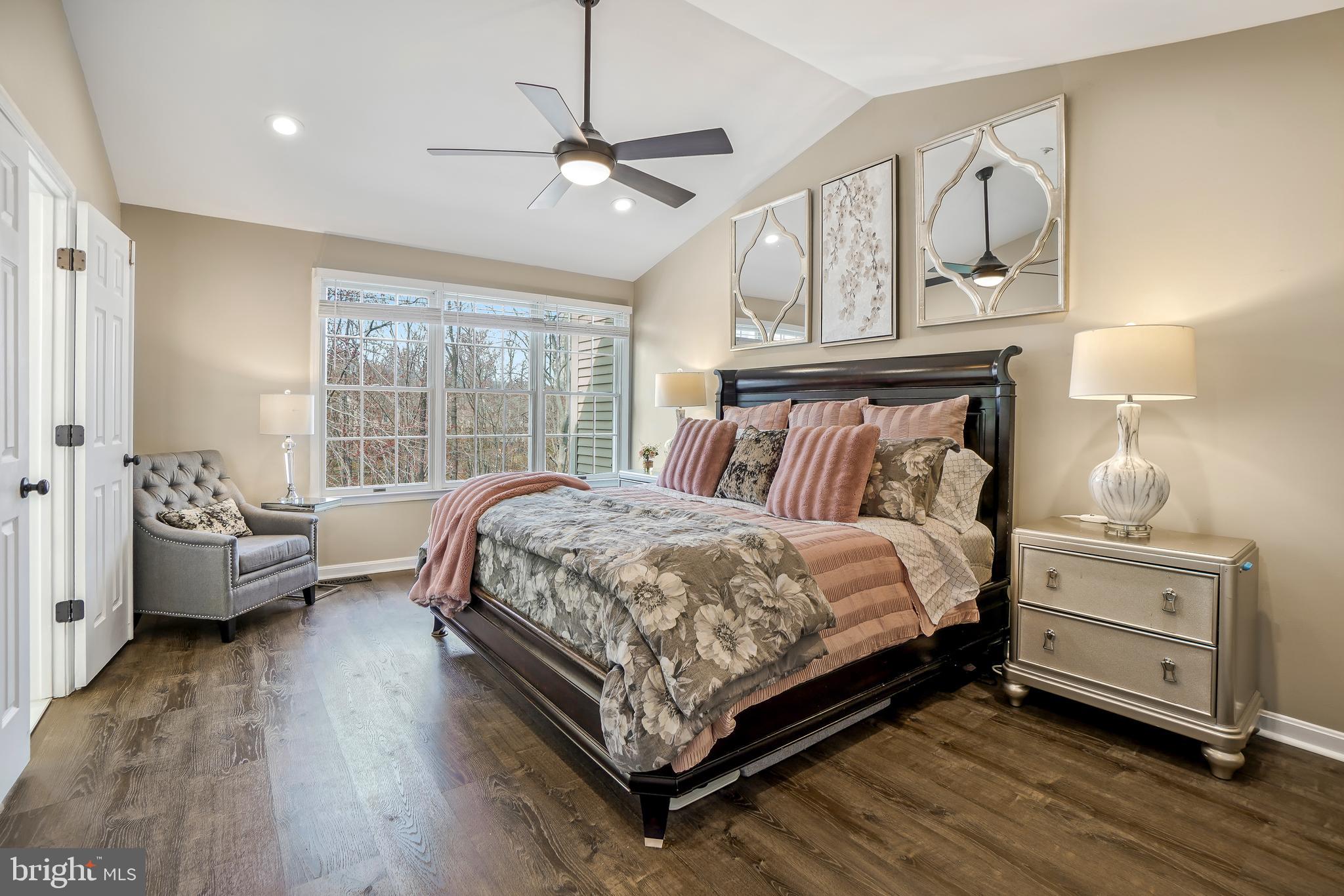 17963 Dumfries Circle Olney, MD 20832 - Photo 17 of 42 a bed room with a bed and a couch