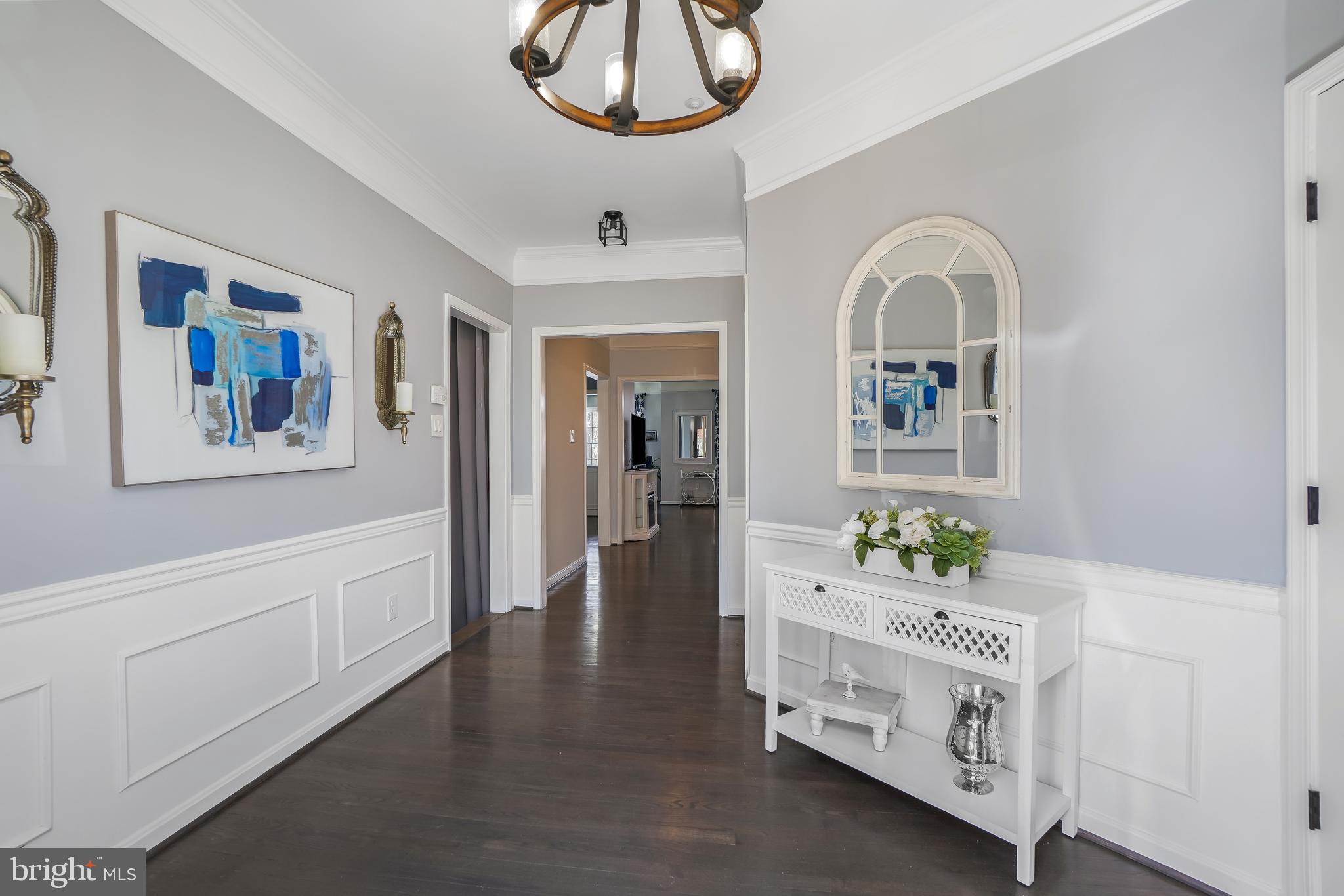 17963 Dumfries Circle Olney, MD 20832 - Photo 2 of 42 a view of an entryway with wooden floor