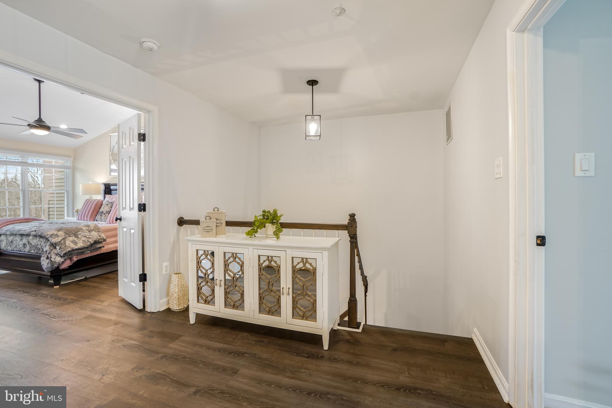 17963 Dumfries Circle Olney, MD 20832 - Photo 22 of 42 a view of a bedroom with furniture and window