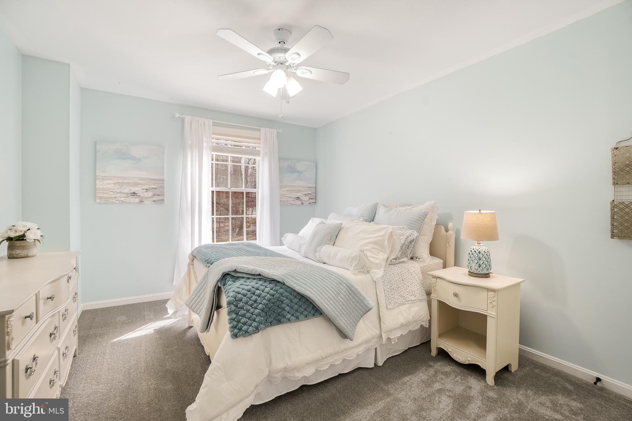 17963 Dumfries Circle Olney, MD 20832 - Photo 23 of 42 a bedroom with a bed and a window