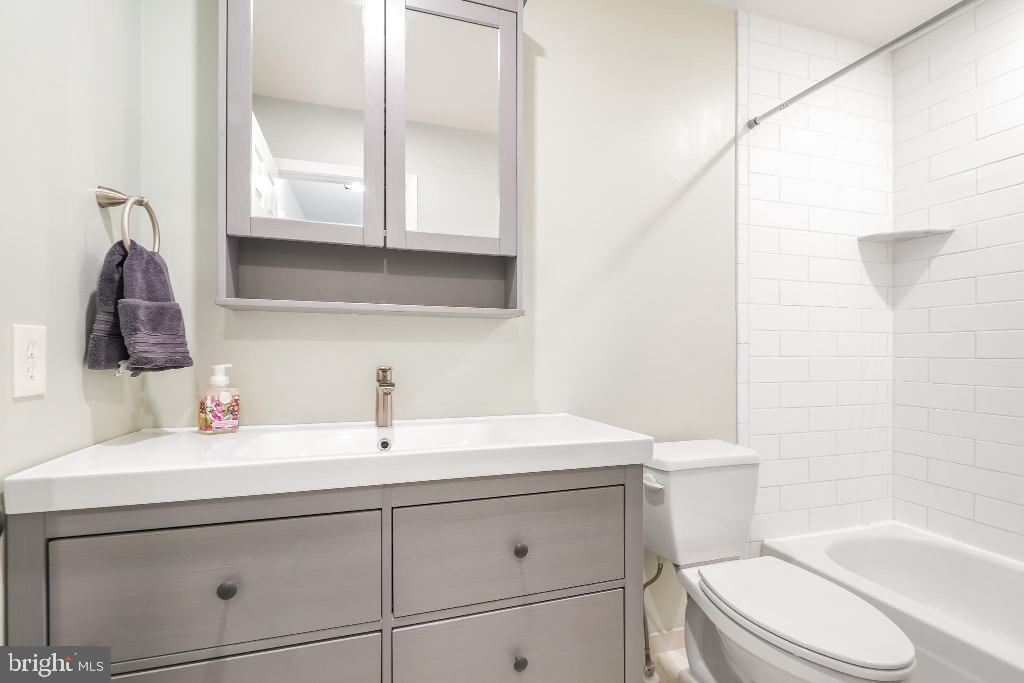 17963 Dumfries Circle Olney, MD 20832 - Photo 26 of 42 a bathroom with a sink a toilet and vanity
