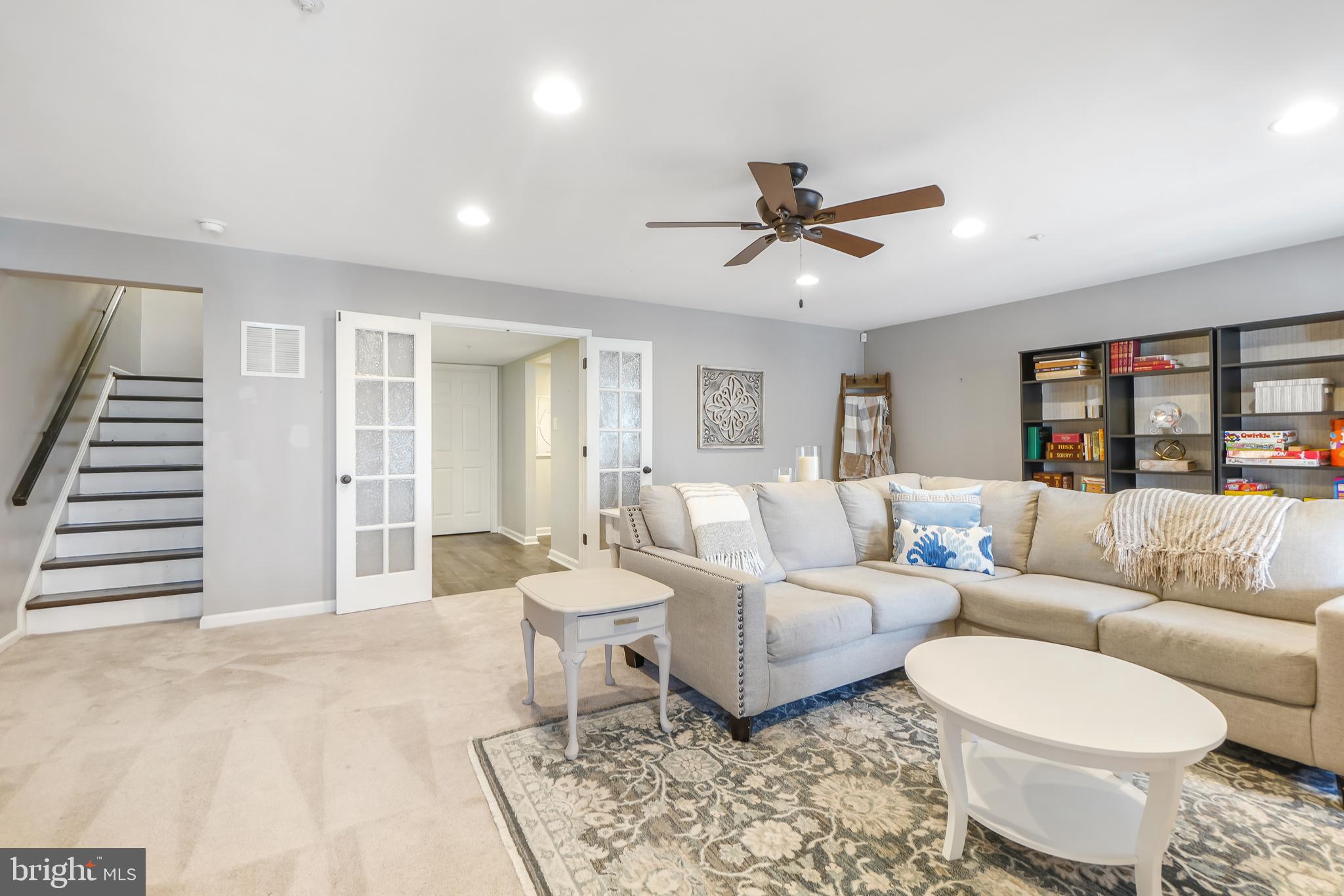 17963 Dumfries Circle Olney, MD 20832 - Photo 29 of 42 a living room with furniture and a large window