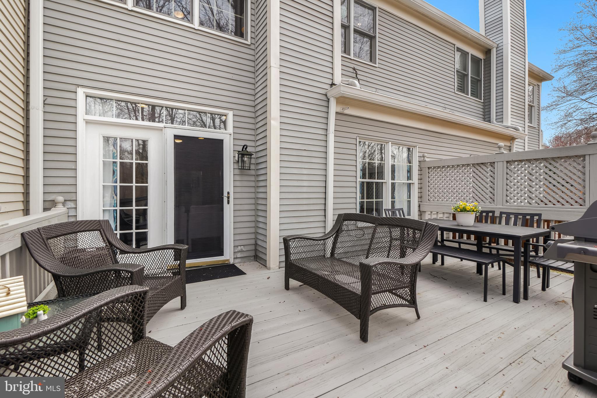 17963 Dumfries Circle Olney, MD 20832 - Photo 32 of 42 a balcony with furniture and wooden floor