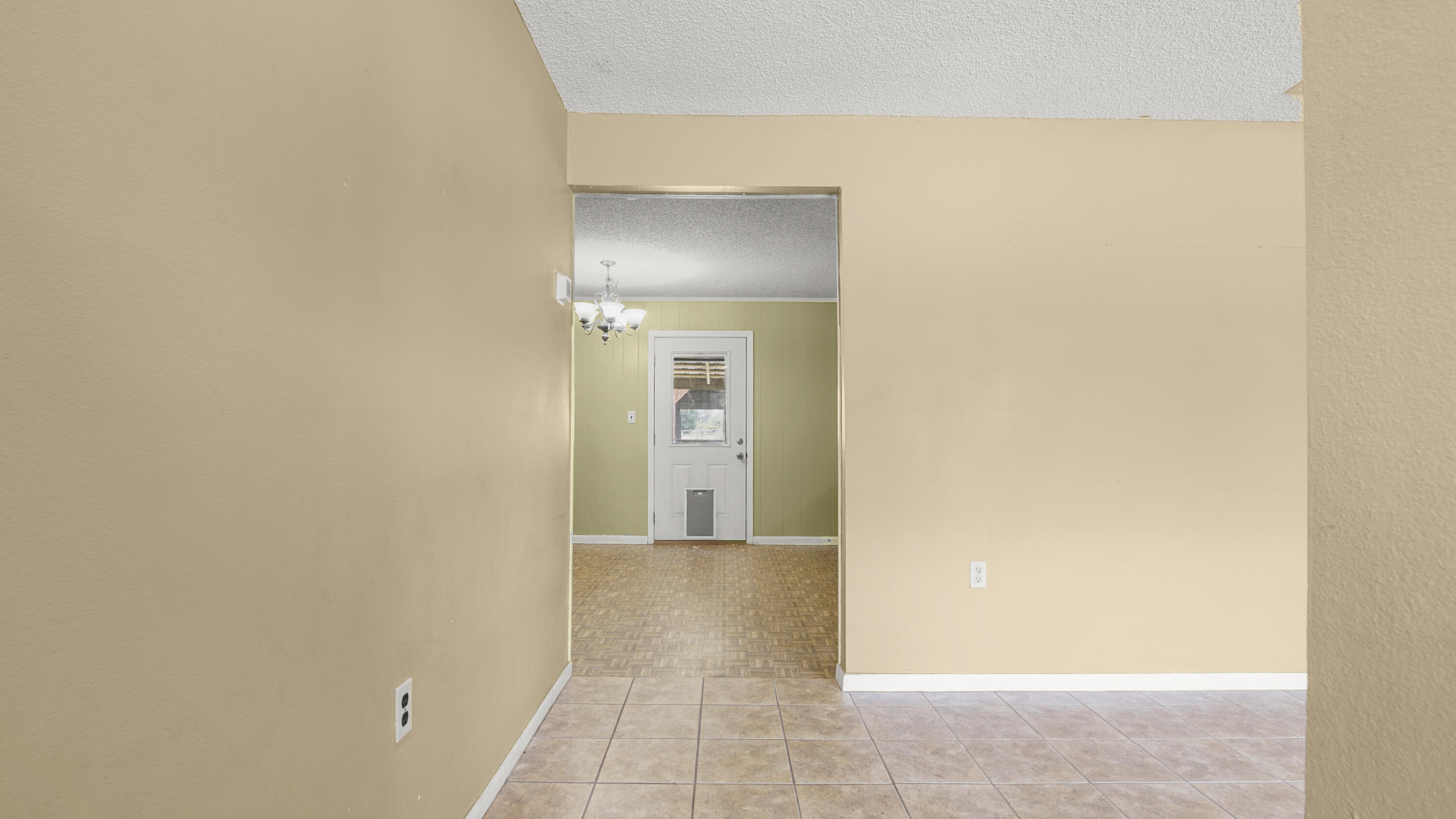 270 Windham Way DeFuniak Springs, FL 32433 - Photo 11 of 51 a view of a hallway with wooden floor