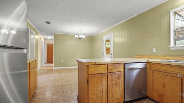 a view of a chandelier in a room