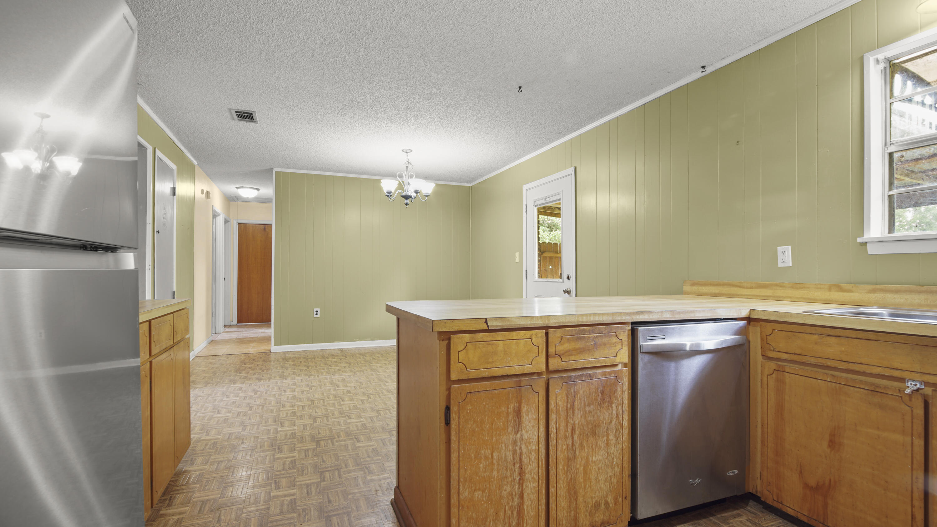270 Windham Way DeFuniak Springs, FL 32433 - Photo 13 of 51 a bathroom with a granite countertop sink a mirror and a shower